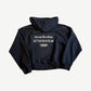 Back of Acne Studios black fleece hoodie with white Acne Studios Stockholm 1996 logo print.