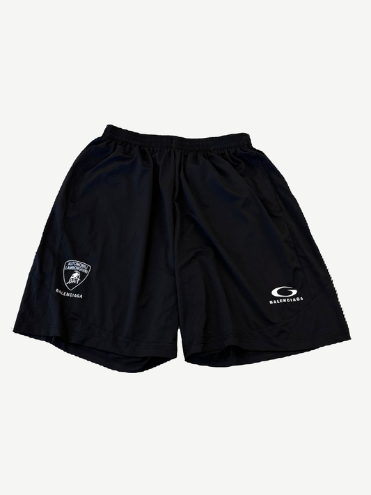 Balenciaga Automobili Lamborghini baggy shorts in black with Lamborghini crest and Balenciaga logo on legs.