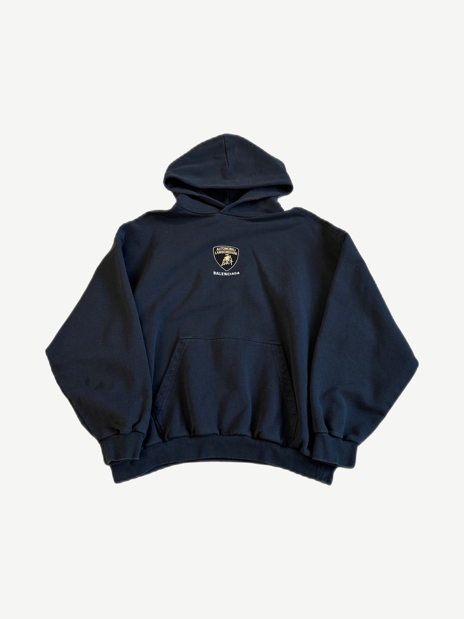 Balenciaga Automobili Lamborghini hoodie in navy with embroidered Lamborghini shield crest and Balenciaga logo.