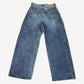 Balenciaga baggy jeans back view with five-pocket construction, leather tab and acid wash finish