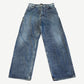 Balenciaga baggy trompe l'oeil jeans front view in mid wash blue denim with wide leg silhouette