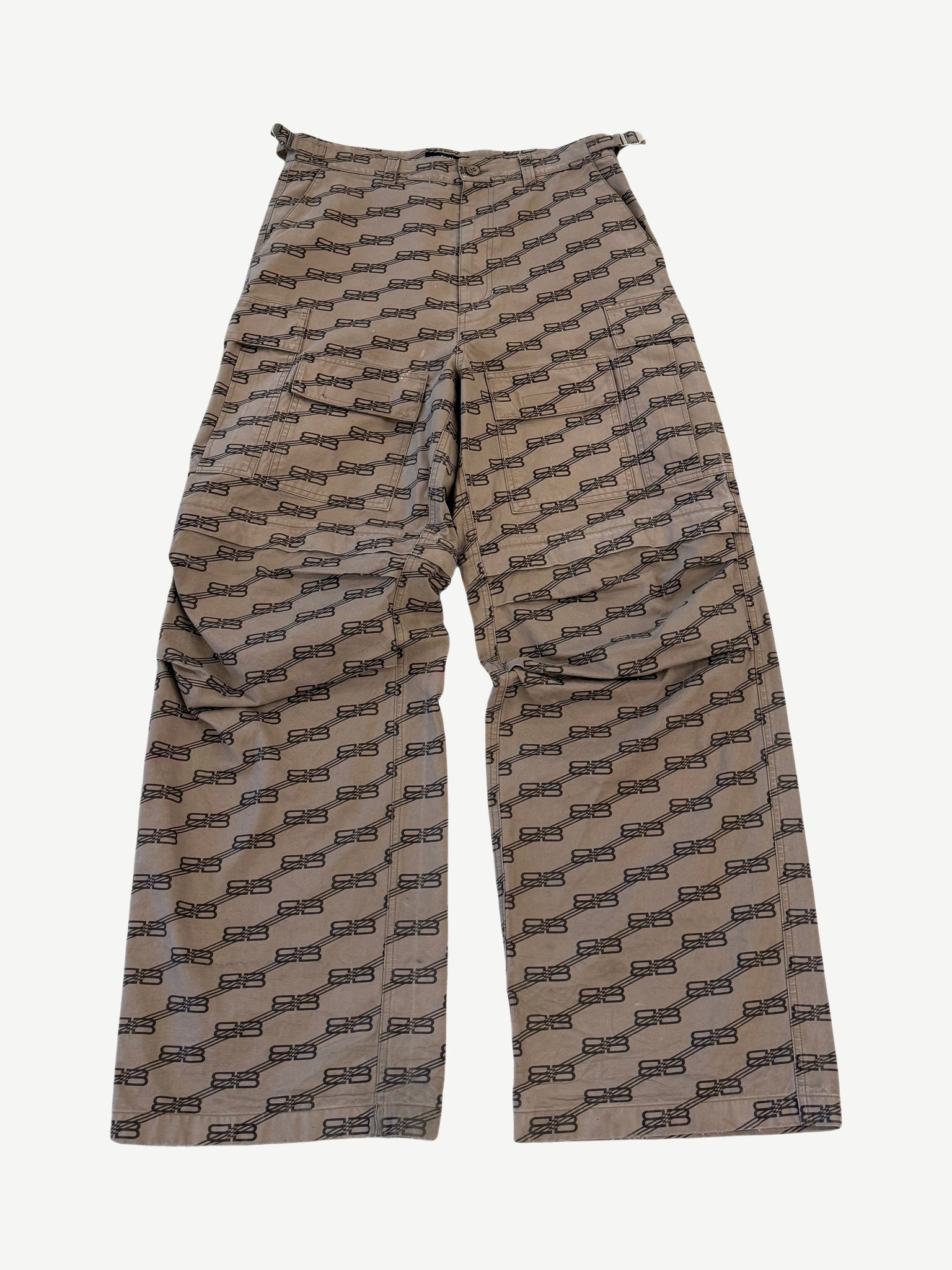 Back view of Balenciaga brown BB monogram cargo pants with wide leg silhouette and side leg cargo pockets.