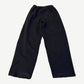 Balenciaga black baggy sweatpants back plain view with distressed raw hem detail