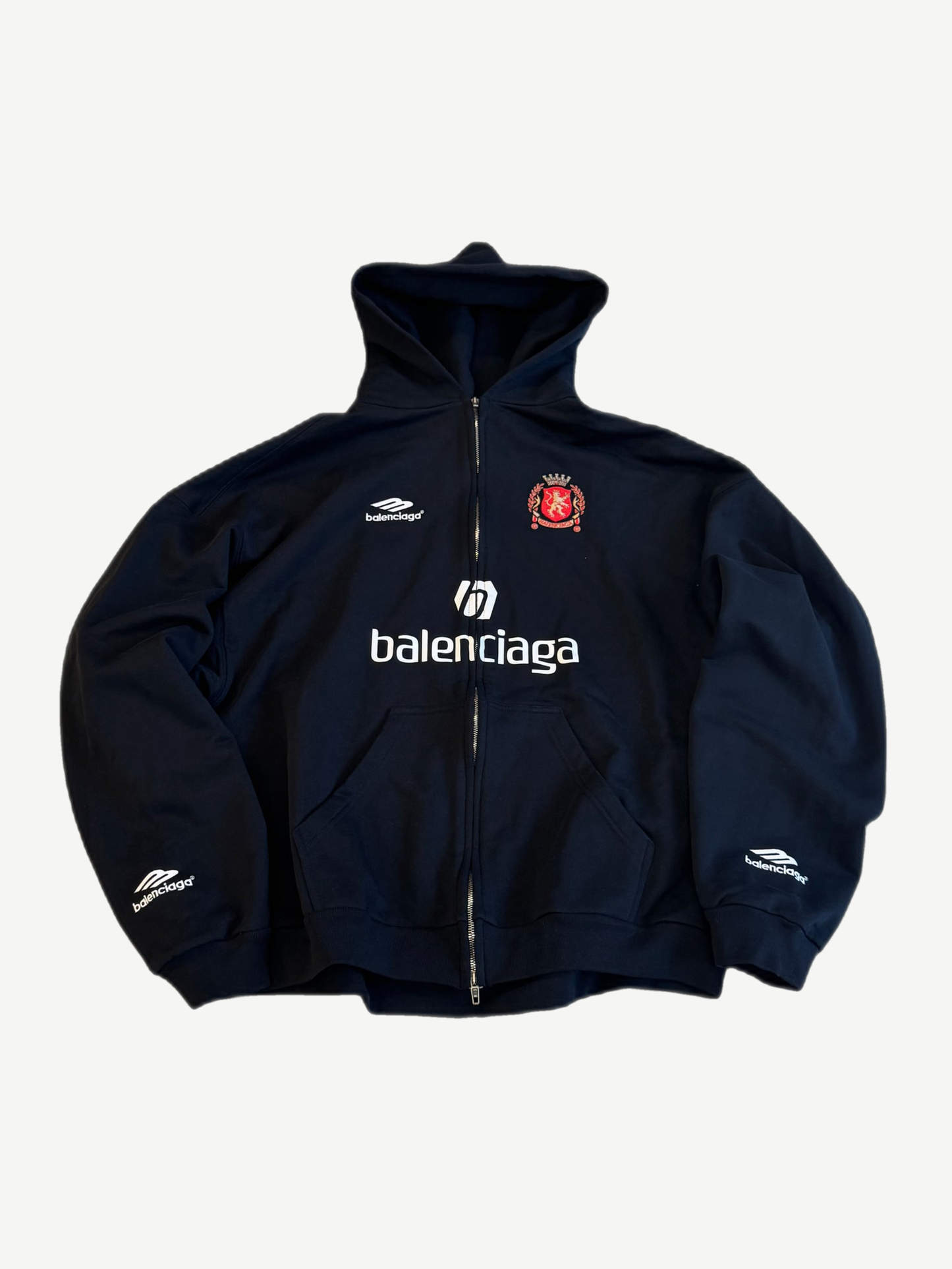 Balenciaga black Paris Soccer zip-up hoodie front with white logo and red soccer crest
