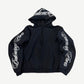 Balenciaga black zip hoodie front with white cursive Balenciaga logo on hood and down both sleeves