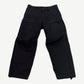 Balenciaga Kick Knee black cargo pants front view with flap thigh pockets and articulated knee paneling