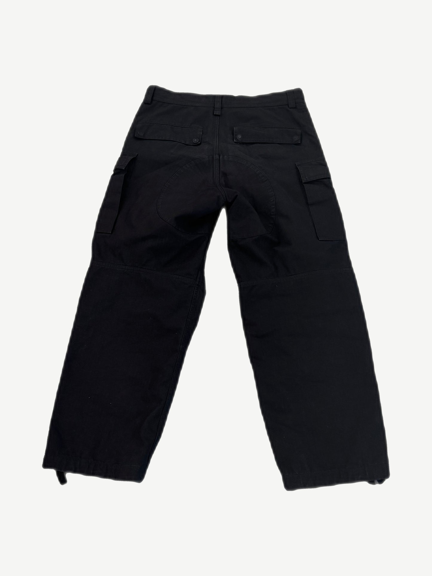 Balenciaga Kick Knee black cargo pants back view with flap rear pockets and seat reinforcement panel