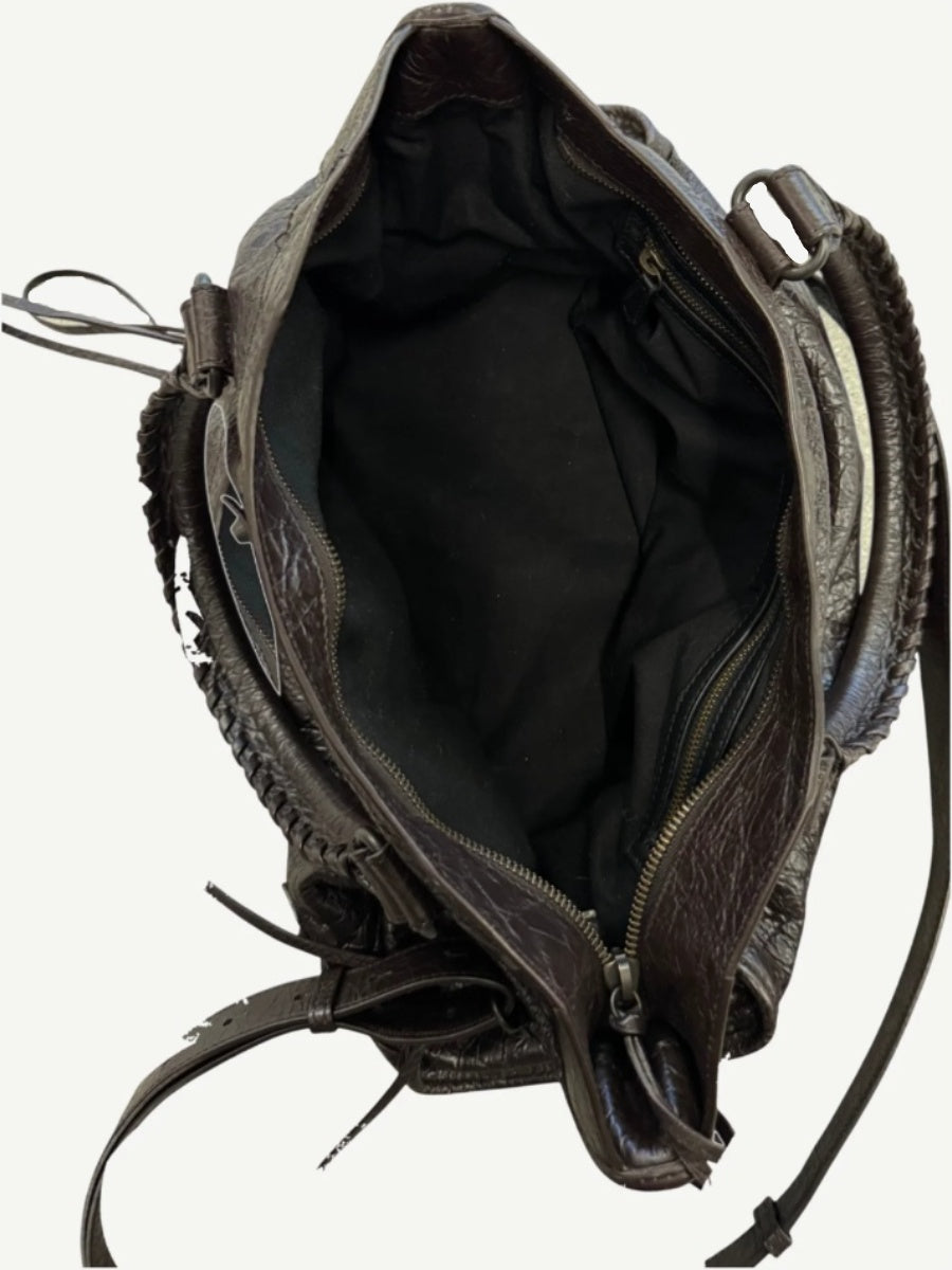 Balenciaga Mocha Le City bag open top-down view showing black canvas interior with zip compartments