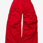 Balenciaga oversized red soft cargo pants with wide leg, flap pockets and cinched elastic waistband