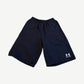 Balenciaga Under Armour sweat shorts in navy with co-branded UA logo and Balenciaga text on right leg.