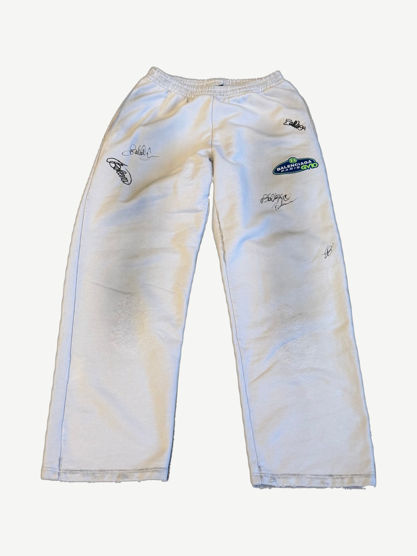 Balenciaga white banana baggy sweatpants front, distressed finish with GVIO Paris graffiti graphic
