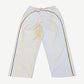 Balenciaga white soccer crest sweatpants back view with elastic waistband and straight leg fleece silhouette