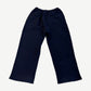 Balenciaga yellow crest logo sweatpants back view in dark navy fleece with elastic waistband and open hem cuffs.