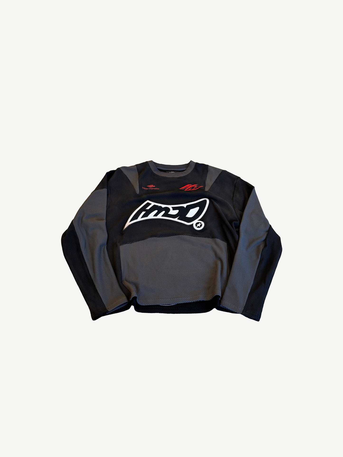 HMDD black moto jersey front detail showing mesh ventilation panels and HMD chest embroidery