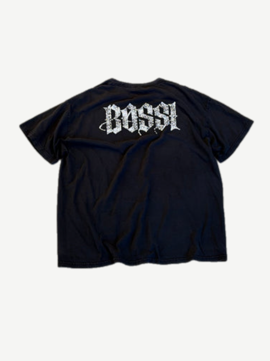 Bossi vintage black tee back view with rhinestone studded skull and barbed wire continuation pattern.