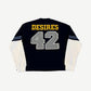 Bottega Desires navy jersey back with yellow DESIRES and reflective 42 patches plus white waffle sleeves