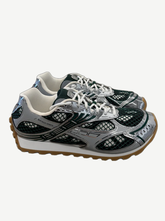 Bottega Veneta Orbit sneaker side view in billiard green leather with silver metallic accents and chunky sole