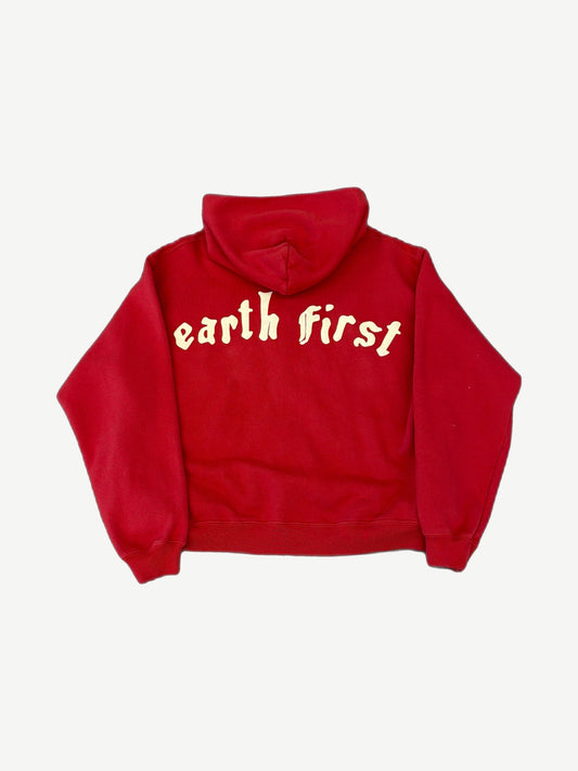Back of CPFM red Earth First zip-up hoodie with large cream gothic earth first lettering arched across shoulders