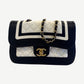 Chanel Paris Cosmopolite small bicolor black and white quilted lambskin flap bag with aged gold CC turnlock