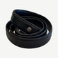 Chrome Hearts 1 inch black leather belt strap coiled showing silver dagger cross button hardware accent