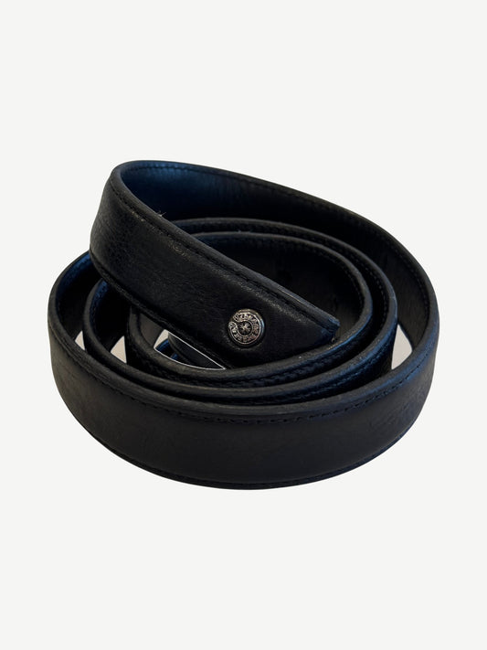 Chrome Hearts 1 inch black leather belt strap coiled showing silver dagger cross button hardware accent
