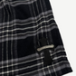 Chrome Hearts After School flannel shorts detail, black leather CH cross patch on plaid pocket