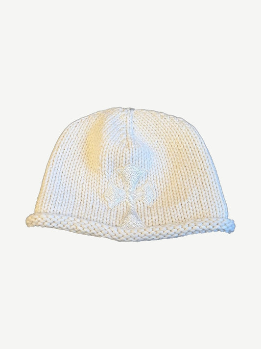 Chrome Hearts cream chunky knit beanie with tonal beaded cross emblem stitched to front and rolled cuff.