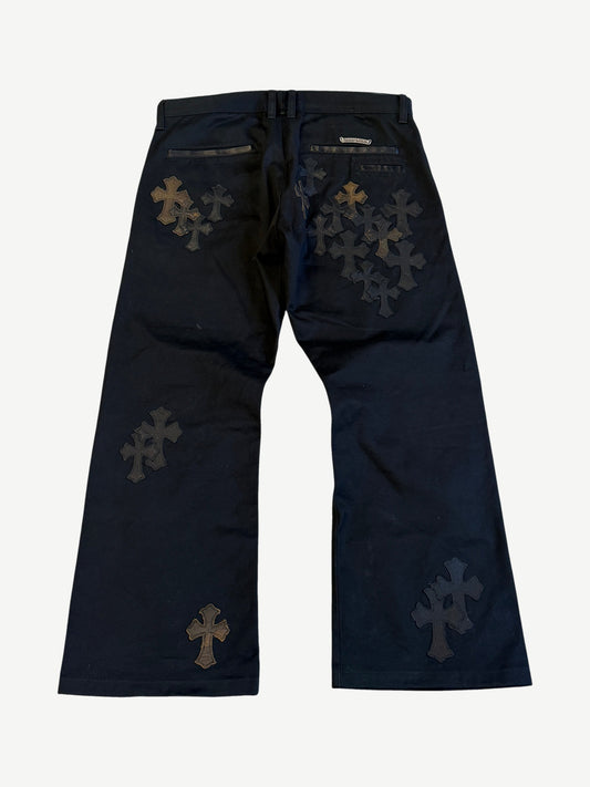 Chrome Hearts black chino pants back showing dense leather cross patch clusters across seat and legs