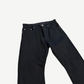 Chrome Hearts black Fleur jeans cropped top-half view showing button fly closure and leather cross knee patches