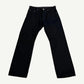 Chrome Hearts black Fleur knee jeans front view with leather cross patch knee appliques and silver hardware