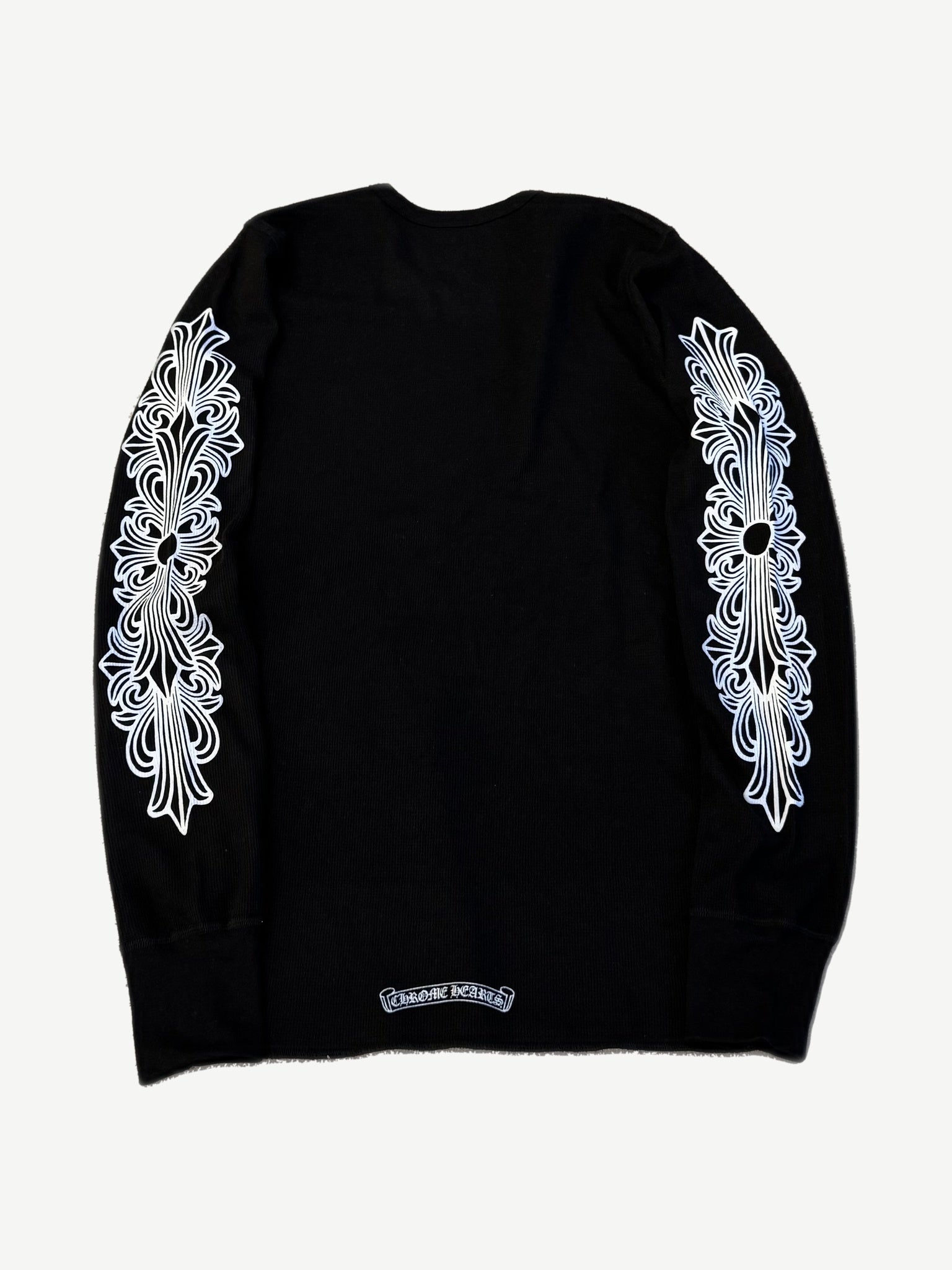 Chrome Hearts black thermal longsleeve back, waffle-knit body with floral cross sleeve graphics and hem logo.