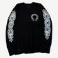 Chrome Hearts black thermal longsleeve with white horseshoe logo on chest and floral cross prints on sleeves.