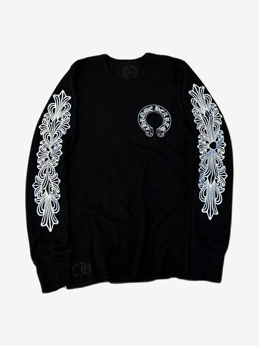 Chrome Hearts black thermal longsleeve with white horseshoe logo on chest and floral cross prints on sleeves.