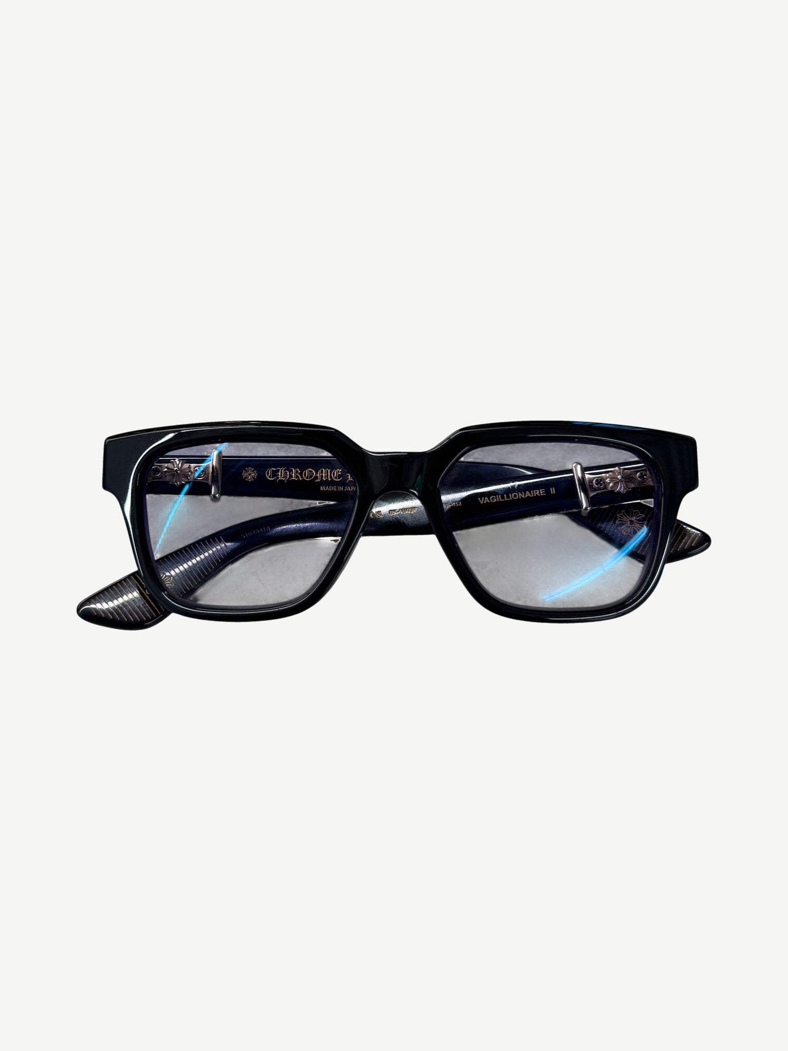 Chrome Hearts Vagillionaire II black acetate glasses front view with clear lenses and bold frames.