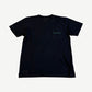 Chrome Hearts black pocket tee with green Cemetery Cross logo print on chest pocket and sleeve.