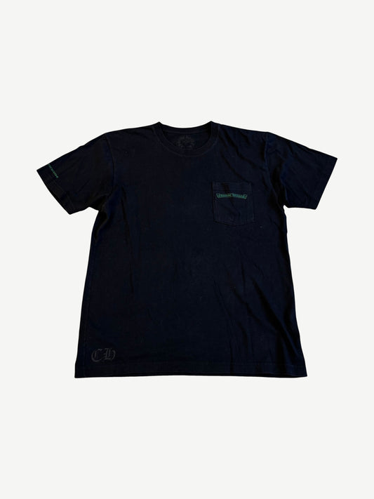 Chrome Hearts black pocket tee with green Cemetery Cross logo print on chest pocket and sleeve.