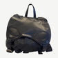 Chrome Hearts black Gunslinger backpack front view with embossed leather cross patches and silver buckles