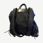 Chrome Hearts black Gunslinger leather backpack detail view showing cross patch hardware and stitching