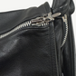 Chrome Hearts black leather Gunslinger messenger bag side view showing adjustable strap and hardware