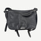 Chrome Hearts black leather Gunslinger messenger bag front with silver cross zipper pulls