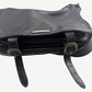 Chrome Hearts black leather Gunslinger messenger bag interior view with cross-stamped lining