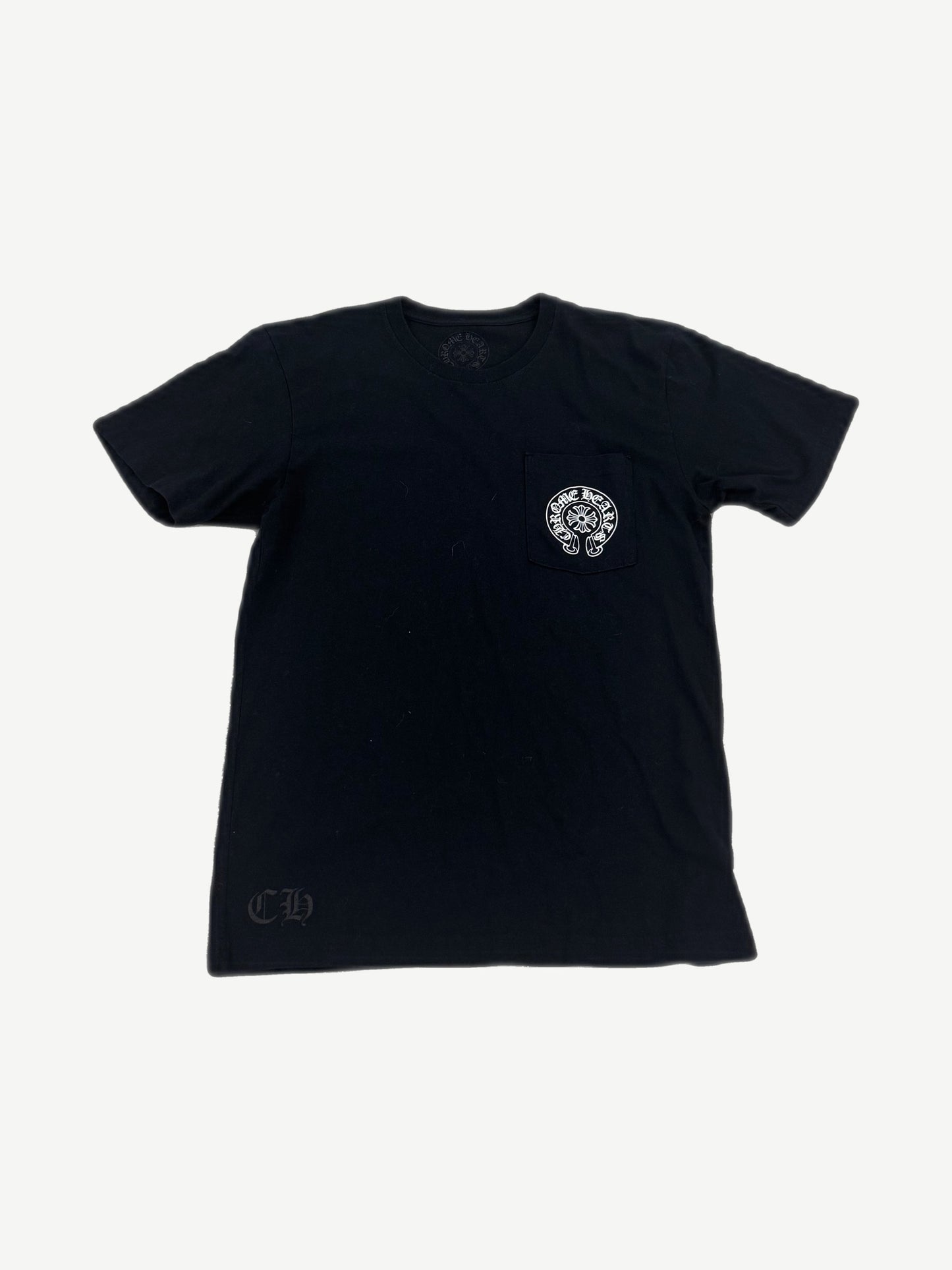 Chrome Hearts black pocket tee with white horseshoe logo on chest pocket and tonal CH hem print