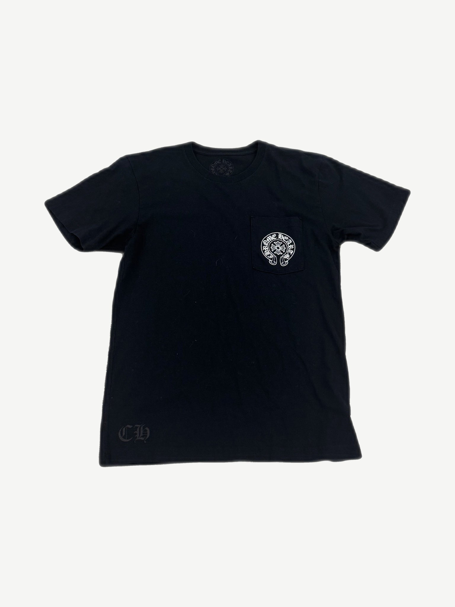 Chrome Hearts black pocket tee with white horseshoe logo on chest pocket and tonal CH hem print