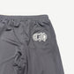 Close-up of Chrome Hearts mesh sweatpants rear waistband with white CH gothic logo embroidered pocket
