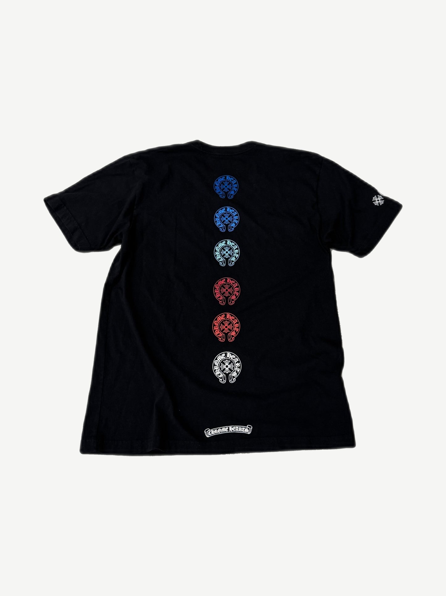 Chrome Hearts horseshoe tee back view with vertical multicolor horseshoe column and scroll banner.