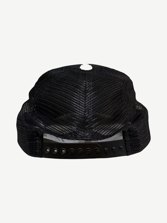 Chrome Hearts NYC CH trucker hat back view in black mesh with adjustable plastic snapback closure.