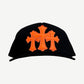 Chrome Hearts black St Barths Cemetery trucker hat with white embroidered cross logos and curved brim.