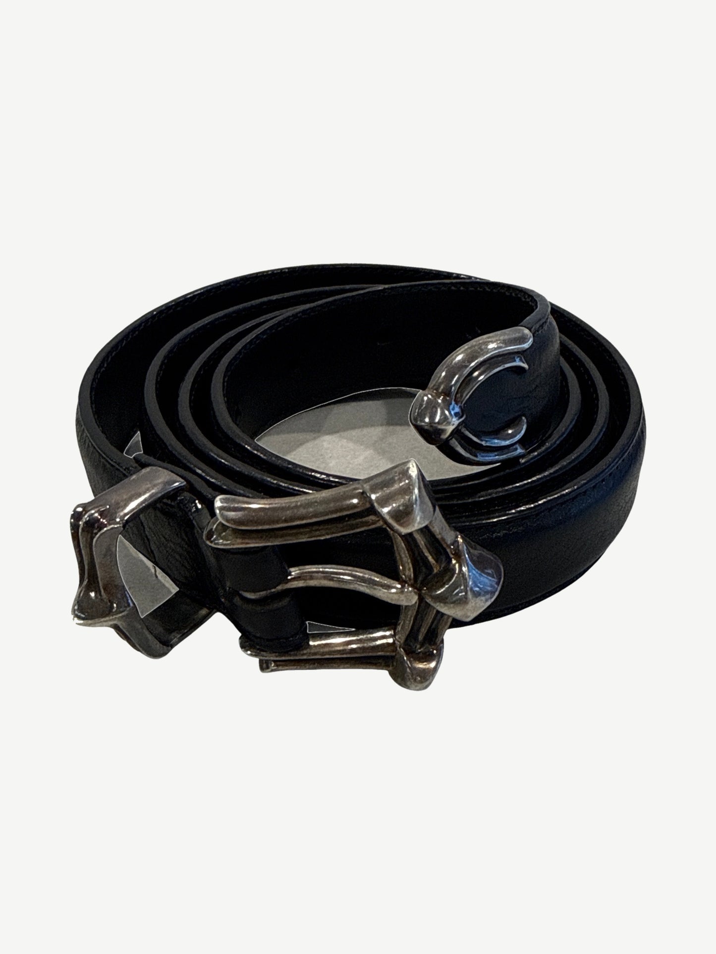 Chrome Hearts black leather three piece belt coiled with sterling silver dagger buckle, keeper and end cap.