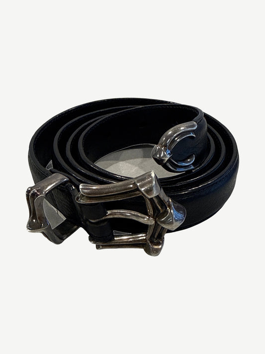 Chrome Hearts black leather three piece belt coiled with sterling silver dagger buckle, keeper and end cap.
