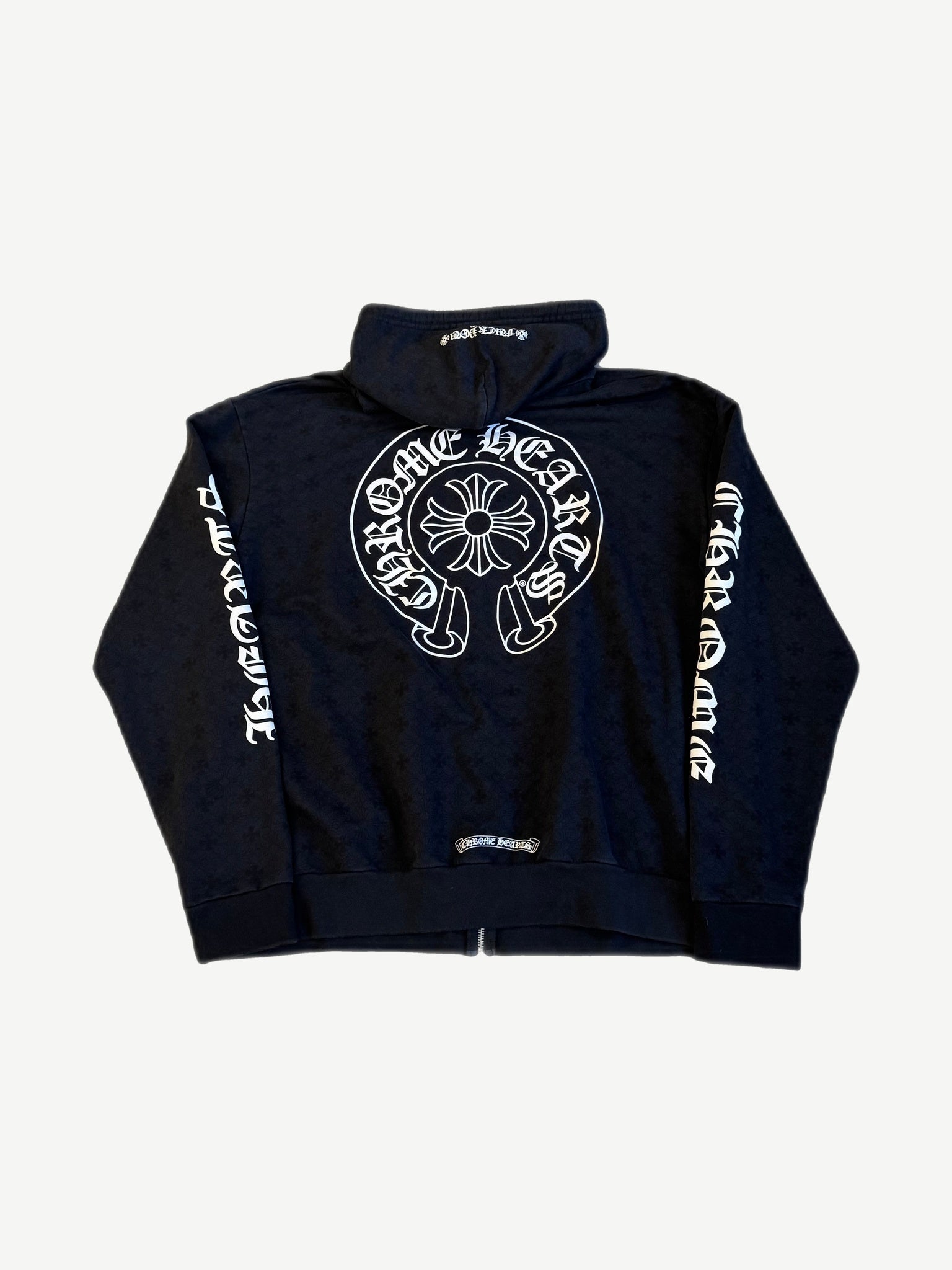 Chrome Hearts tonal monogram zipup back view with white horseshoe cross logo and dagger sleeve prints